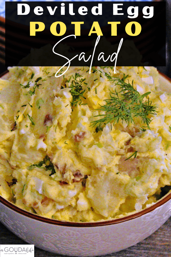 white bowl with Deviled Egg Potato Salad