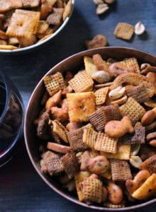 small copper bowl piled high with buffalo ranch snack mix