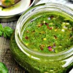 clear glass mason jar with basil chimichurri