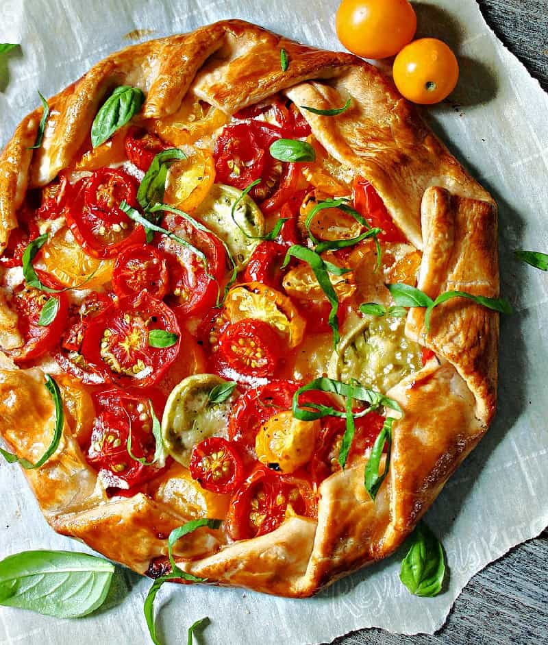 overhead view Tomato Galette garnished with fresh basil