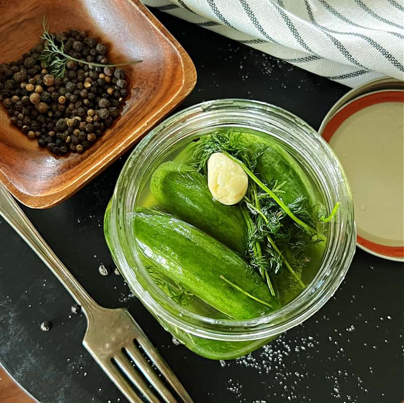 overhead view refrigerator dill pickles in a jar