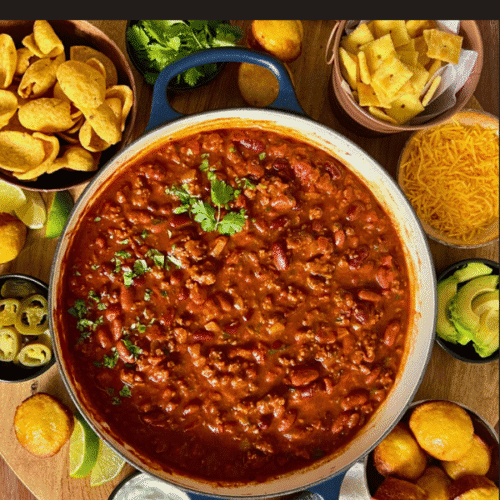 overhead view of pot of chili plus best finger foods with chili