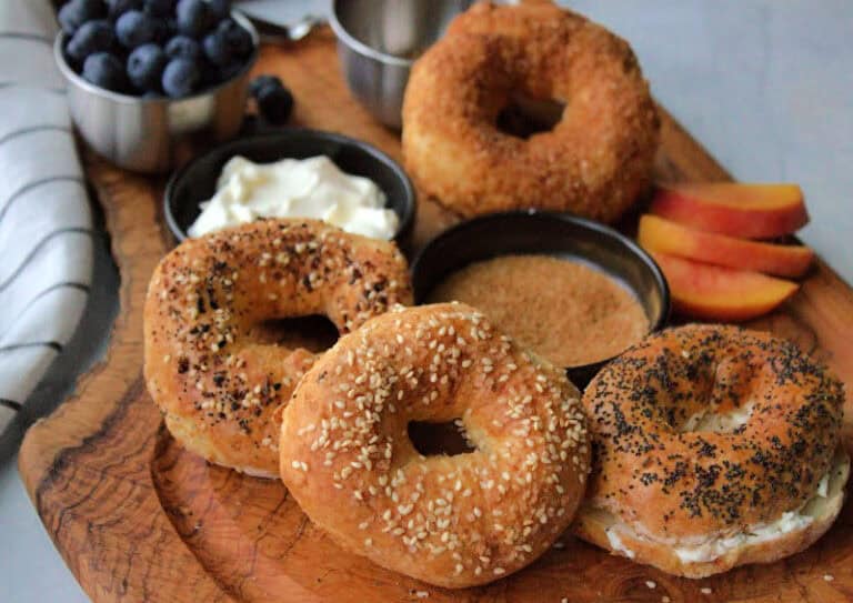 overhead view of air fryer bagels and fruit