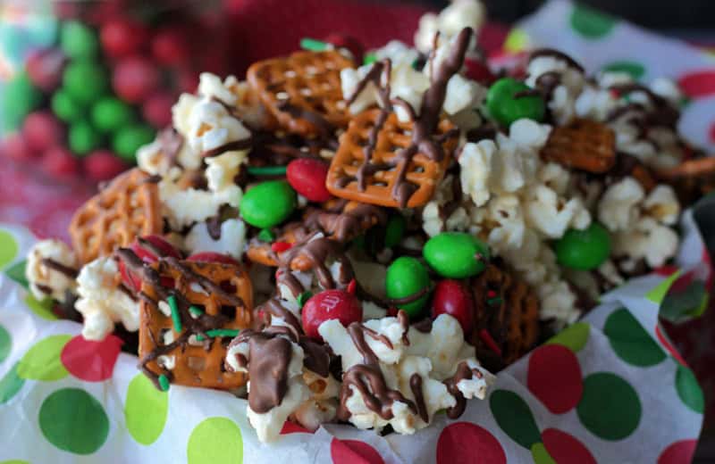closeup of christmas popcorn in a holiday tin