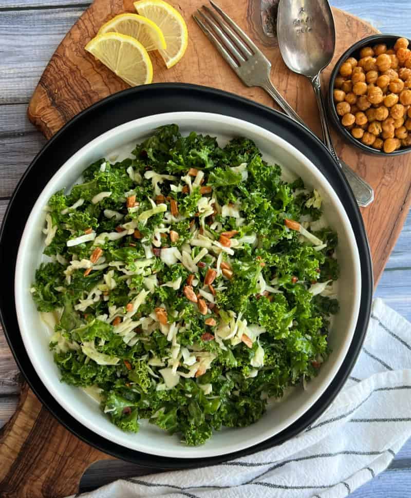 overhead view kale crunch salad and small bowl of crispy chickpeas