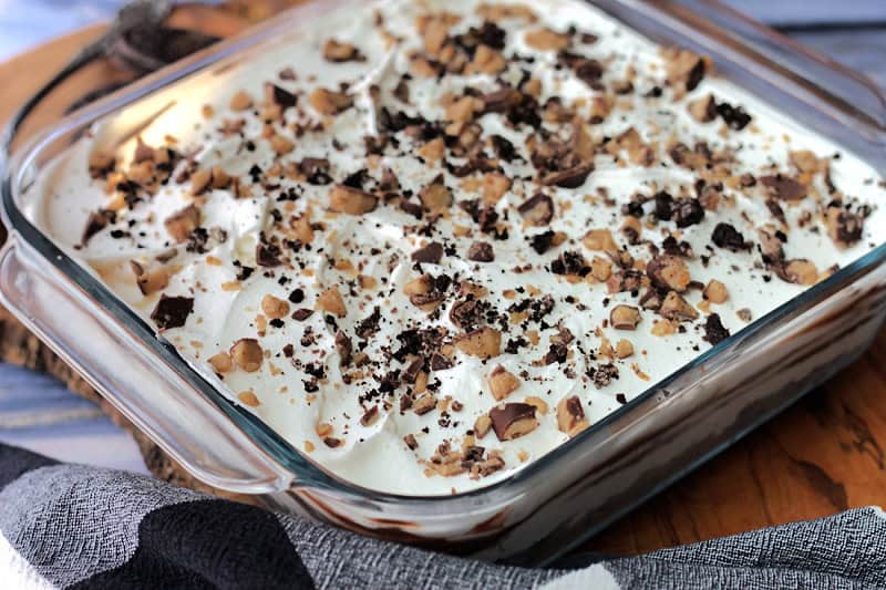 clear baking dish with chocolate lasagna topped with heath english toffee bits