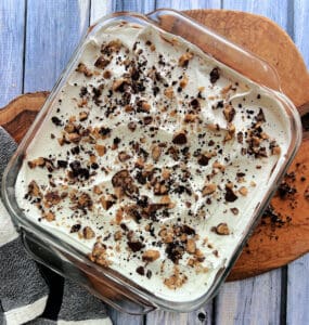 overhead view chocolate lasagna topped with english toffee bits