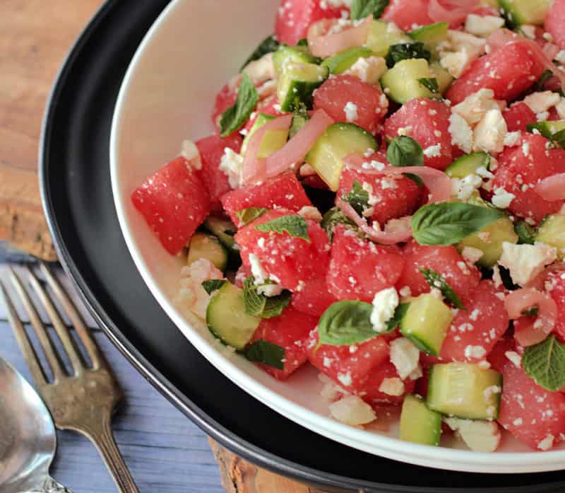 closeup of watermelon feta salad in white bowl