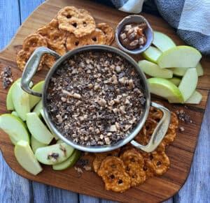 overhead view caramel apple dip surrounded by sliced apples