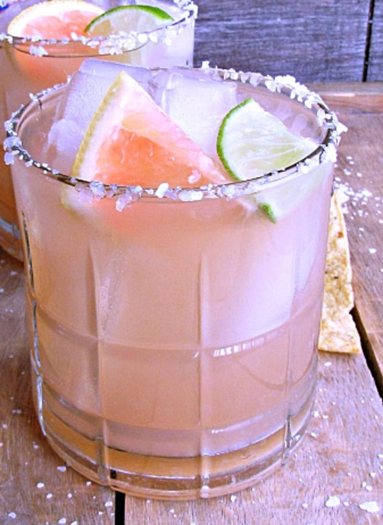 Grapefruit Margarita ~ the perfect balance of sweet and tangy ~ a classic beverage with a tropical twist. Enjoy with chips and salsa for easy entertaining.