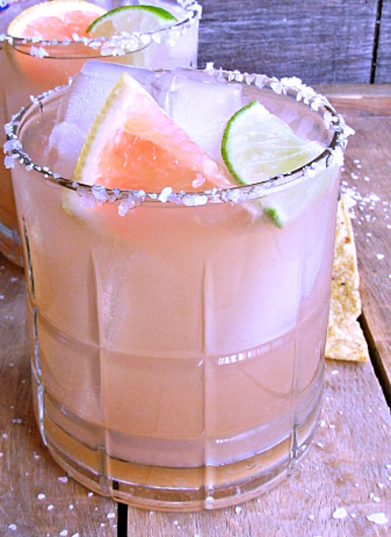 Grapefruit Margarita ~ the perfect balance of sweet and tangy ~ a classic beverage with a tropical twist. Enjoy with chips and salsa for easy entertaining.