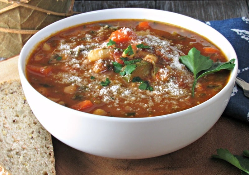 Tomato White Bean Soup: thick tomatoey broth infused with herbs and packed with beans and vegetables including superfood spinach.