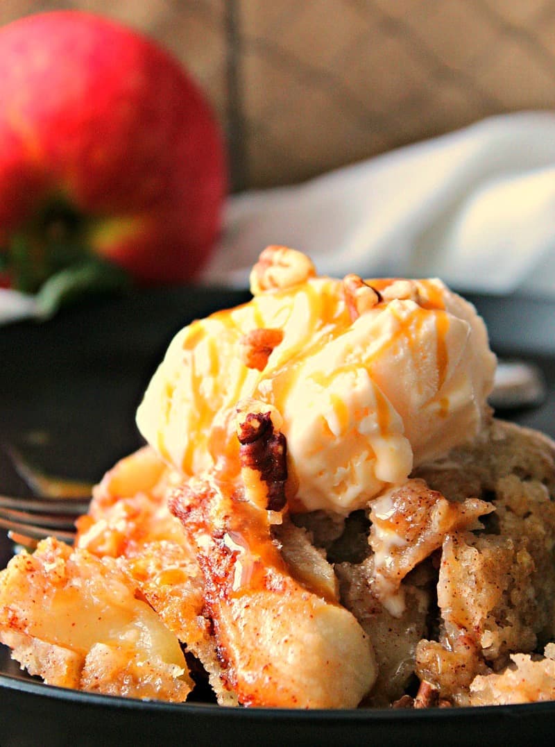 Apple Cobbler recipe ~ easy, traditional from scratch. Loaded with fresh apples bursting with fall flavor and covered with a simple cake topping.