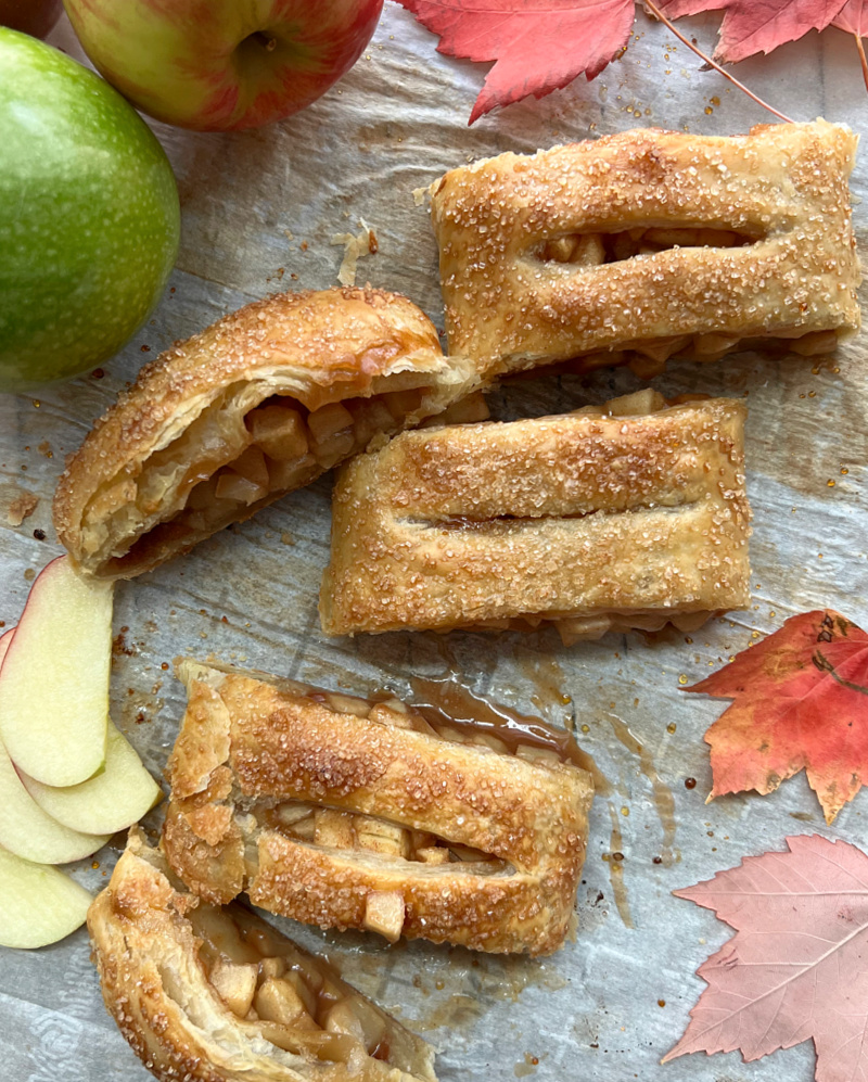 sliced puff pastry apple strudel on parchment paper