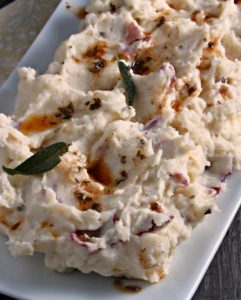 Brown Butter Mashed Potatoes, rustic, creamy, cheesy enhanced with fresh sage. The perfect side dish. Make up to a day ahead for easier entertaining.