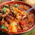 green bowl with stuffed cabbage soup