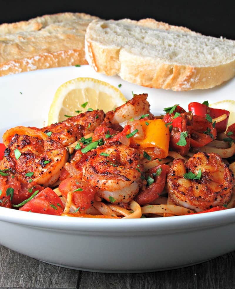 Blackened Shrimp Pasta ~ Cajun shrimp and linguine in a zesty, flavorful tomato sauce. A simple, weeknight meal that's also ideal for entertaining.