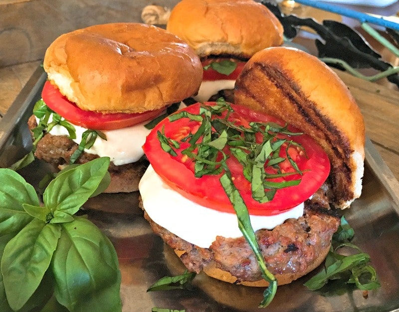 Caprese Slider - two summer favorites - specially seasoned grilled burgers and caprese salad all between a delicious grilled bun. 