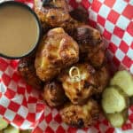 red checked lined basket with air fryer chicken nuggets