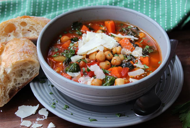 gray bowl with easy garbanzo bean soup in tomato broth