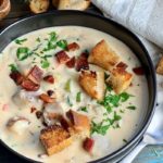 black bowl of easy clam chowder, new england style