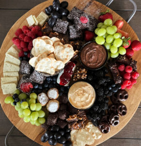 overhead view dessert charcuterie with variety of snacks and sweets