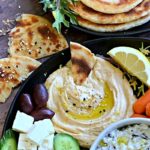 2 Ingredient Dough made into naan bread shown on Greek appetizer platter