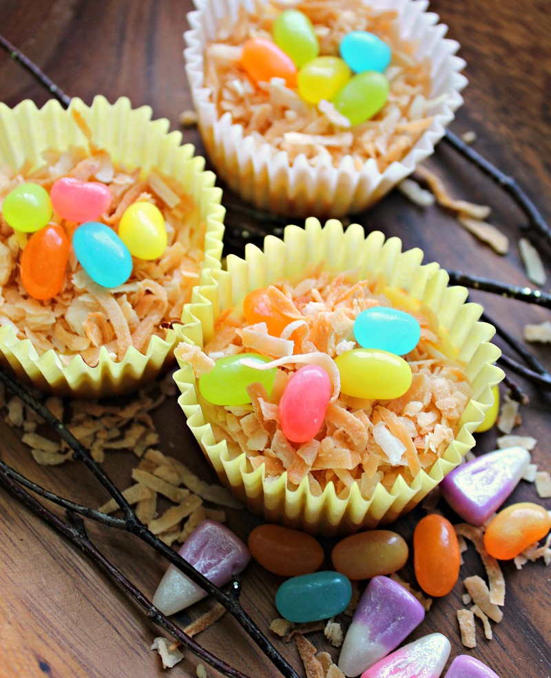 mini easter cheesecakes with toasted coconut and jelly beans