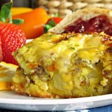 Overnight Breakfast Egg Sausage Casserole: eggs, sausage, 3 kinds of cheese and fresh herbs. Prep the night before for an easy morning.