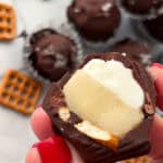 closeup of frozen chocolate banana yogurt bites cut in half showing inside it