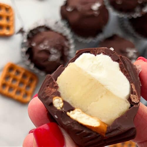 closeup of frozen chocolate banana yogurt bites cut in half showing inside it