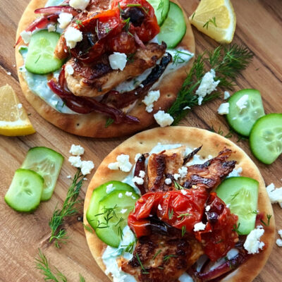 greek chicken recipe used in greek pizza topped with tomatoes and feta