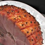 Rum Pineapple Glazed Ham ~ baked ham with a delicious tropical rum-pineapple glaze for a sweet-salty flavor, ideal for any get-together.