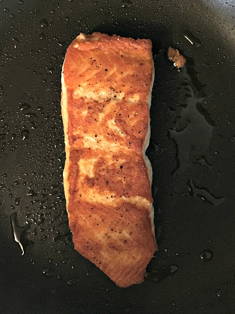 Creamy Honey Mustard Salmon: crispy pan-seared salmon topped with light, creamy sweet-tangy herbed honey mustard sauce goes stove to table in 20 minutes.