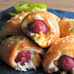 sausage links wrapped in cheese filled crescent dough