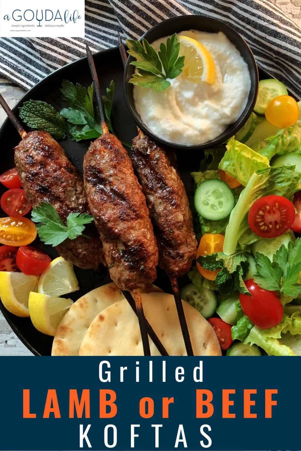 pinterest pin showing black plate with 3 kofta kabobs, naan bread and tzatziki
