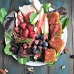 Michigan Salad recipe inspired by the classic Michigan Salad, but updated with with farm-fresh ingredients and a homemade raspberry-champagne vinaigrette.