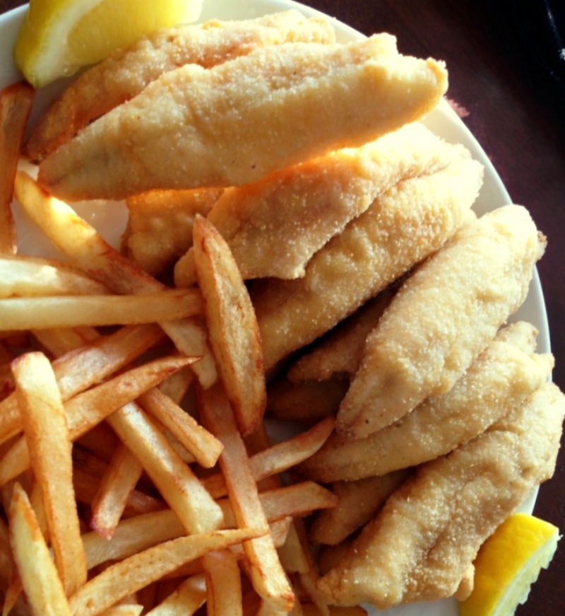 white plate with fried perch and french fries