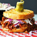 slow cooker bbq pulled chicken on texas toast with pickle slices