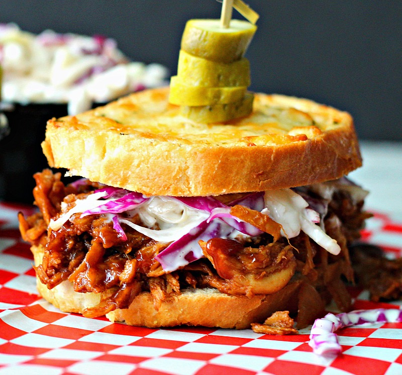 slow cooker bbq pulled chicken on texas toast with pickle slices