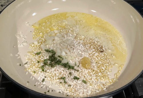 pan showing the beginning of making pumpkin rice (risotto)