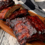 slab of air fryer bbq ribs on cutting board