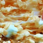 closeup of best rice krispie treats with marshmallow pull