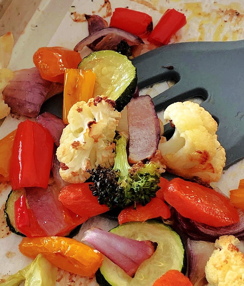mixed roasted vegetables on a sheet pan