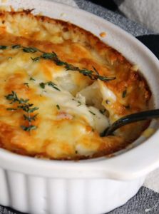 Easy Au Gratin Potatoes ~ layers of tender potatoes in a creamy, cheesy sauce and golden brown slightly crispy top. A classic comfort food side dish.