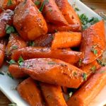 white plate with chopped glazed carrots