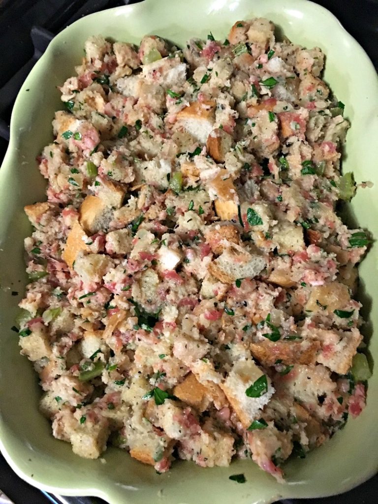 unbaked sausage herb stuffing in casserole dish