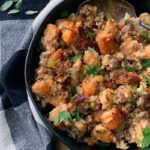 bowl of stuffing with black and white checked napkin