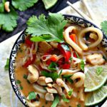 pad thai soup garnished with cilantro and lime