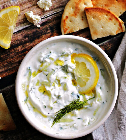 what to serve with naan bread - bowl of tzatziki shown